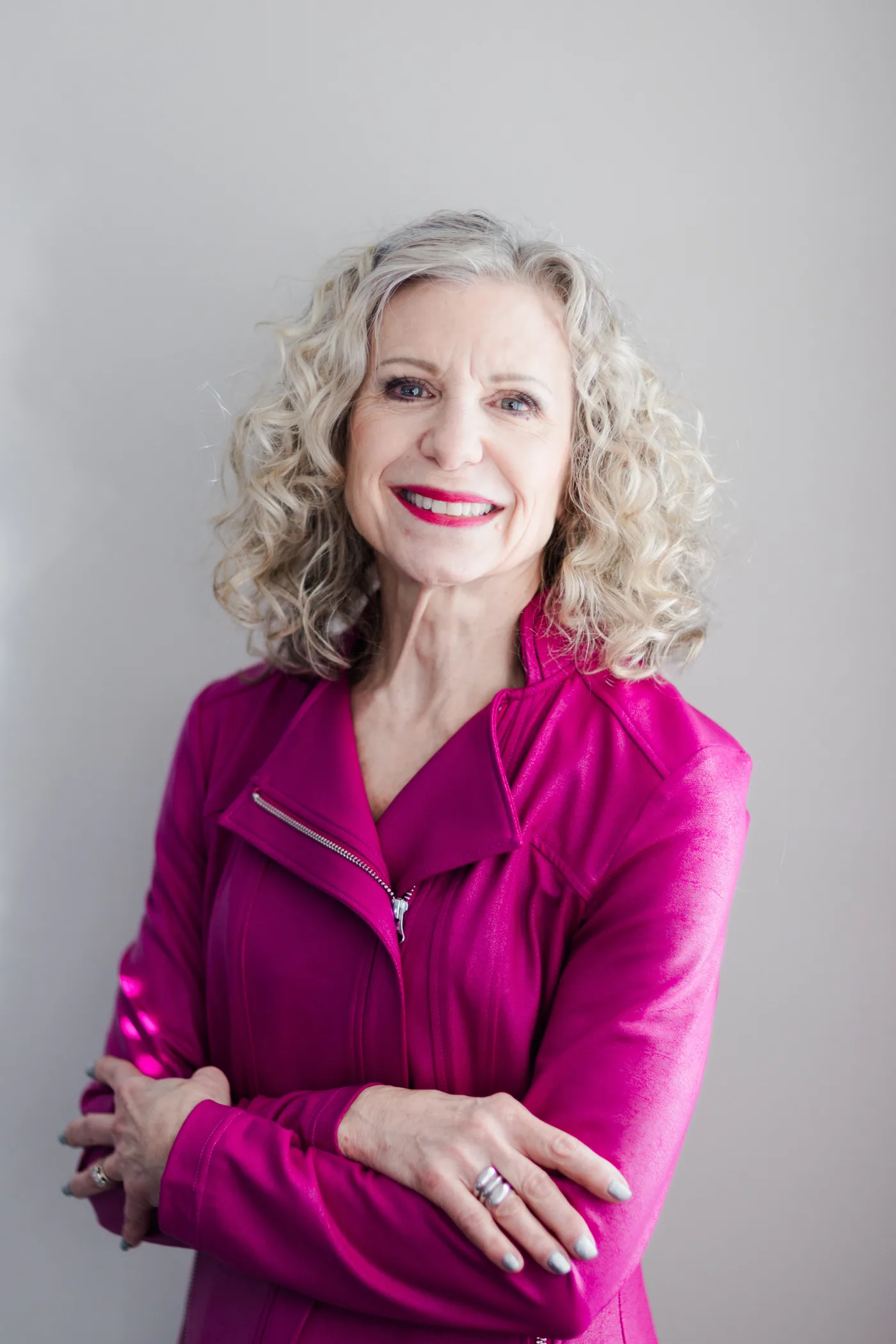 Pat, founder of Loving My Look, in a rose jacket